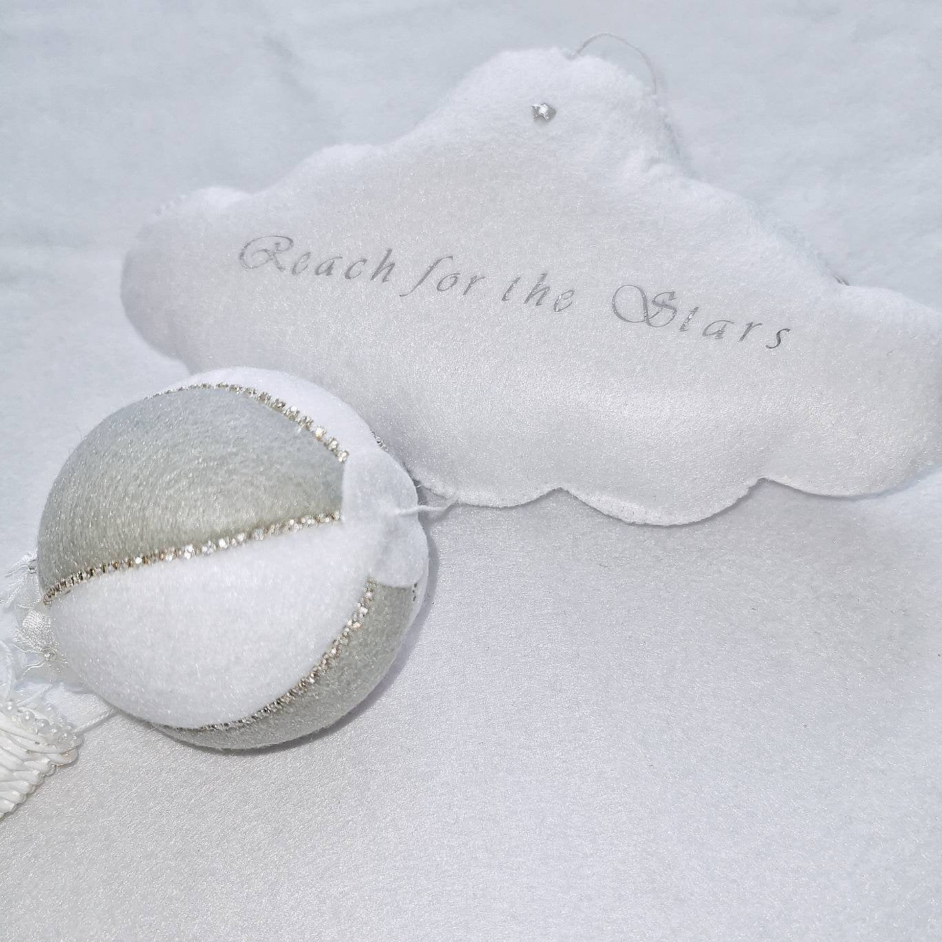 Handcrafted balloon with pearl detailing and cloud embroidery—designed as a keepsake gift for little dreamers.

