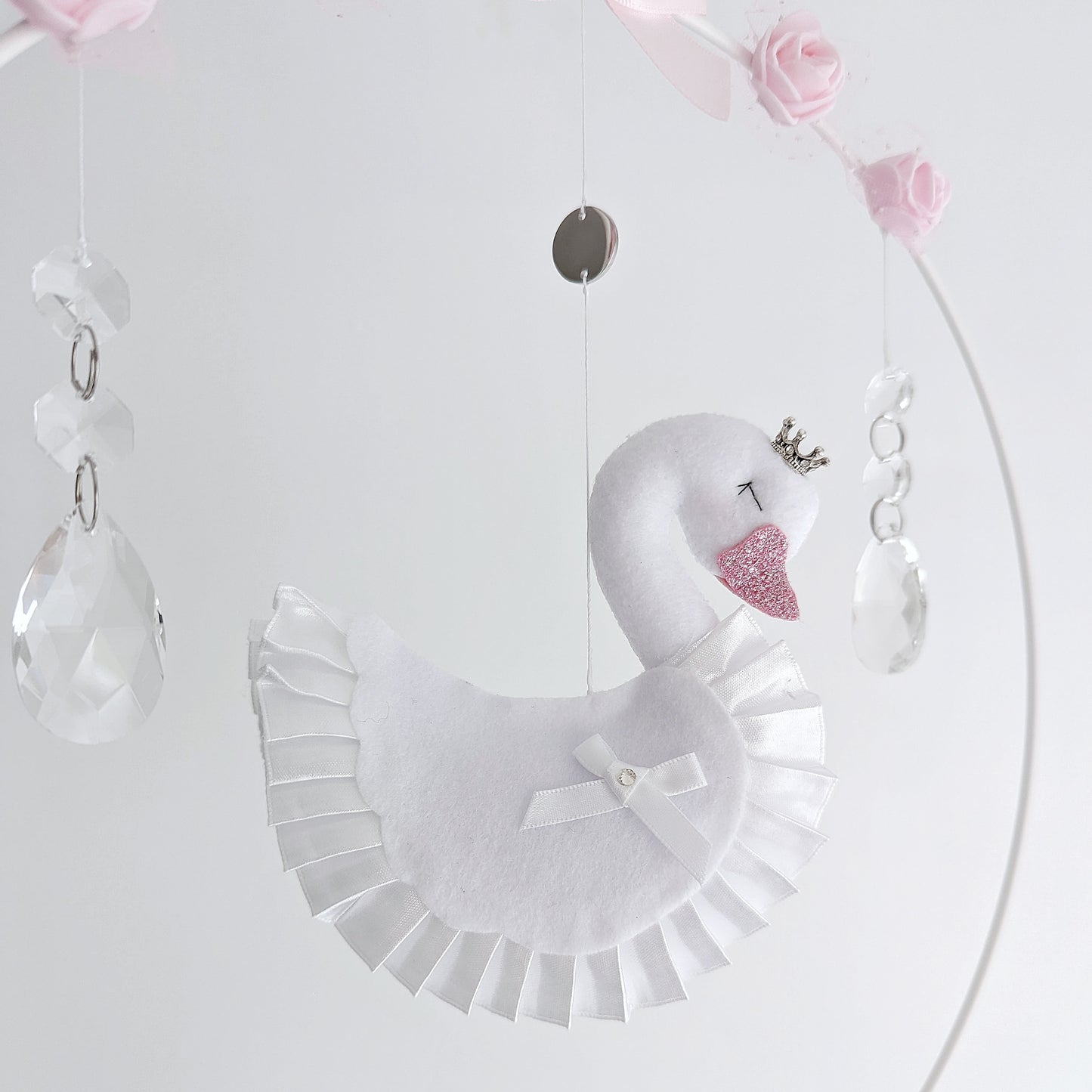 Sweet swan princess mobile with pink hearts, clouds, and a handcrafted balloon, perfect for a baby girl’s space.