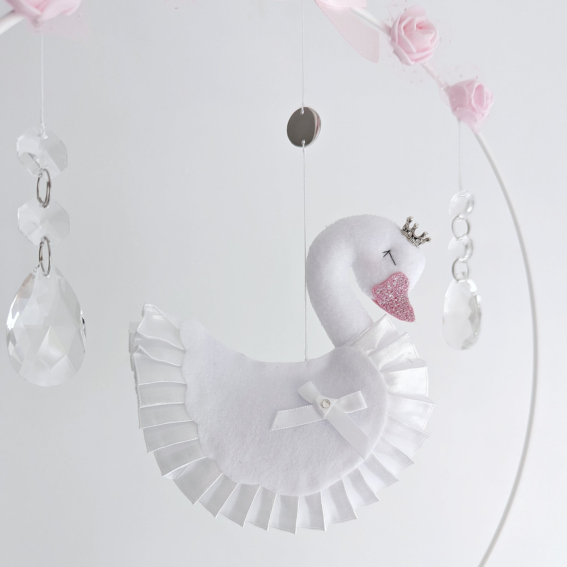 Sweet swan princess mobile with pink hearts, clouds, and a handcrafted balloon, perfect for a baby girl’s space.